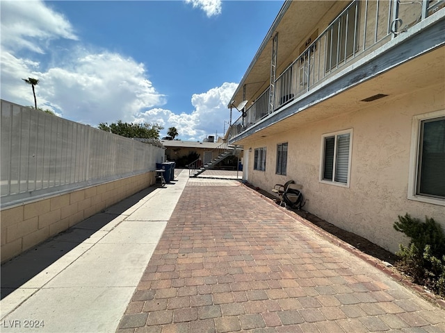 view of patio / terrace with a balcony