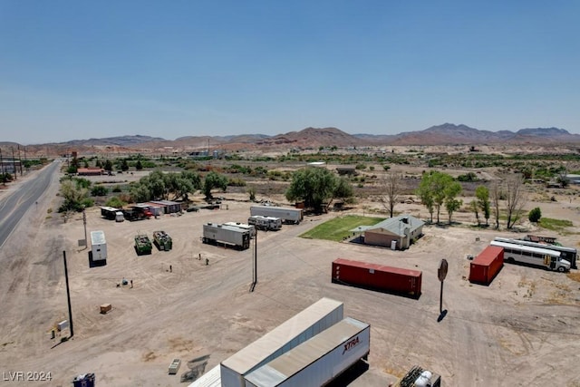 birds eye view of property featuring a mountain view