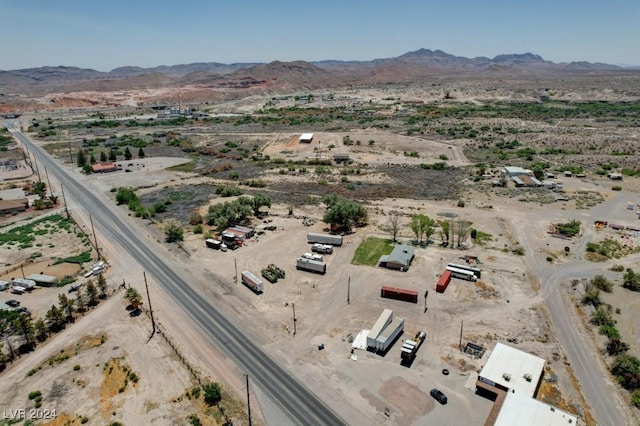 aerial view featuring view of desert, a rural view, and a mountain view