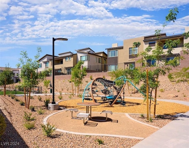 surrounding community featuring a playground