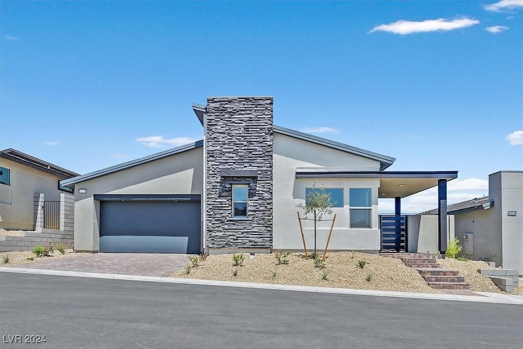 contemporary home with a garage