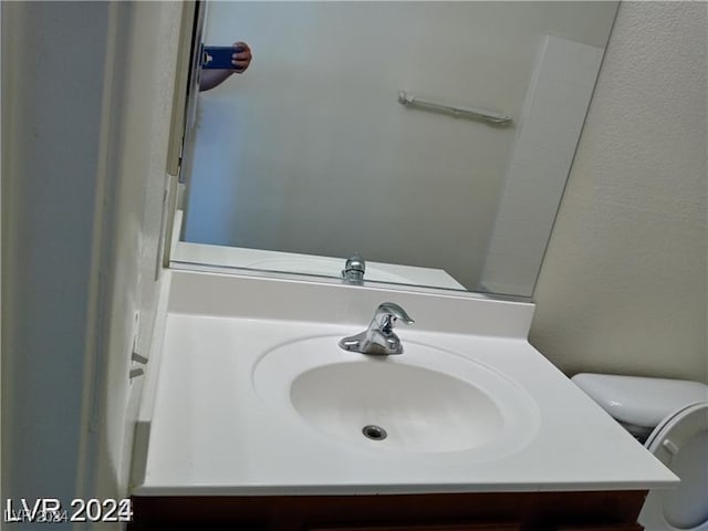 4085 Oliver Sagebrush Dr, Las Vegas, NV 89122 - bathroom with vanity and toilet