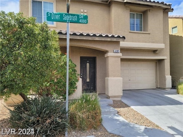 view of front of home featuring a garage