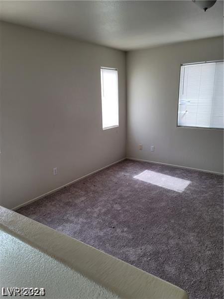 4085 Oliver Sagebrush Dr, Las Vegas, NV 89122 - unfurnished room with carpet floors and baseboards
