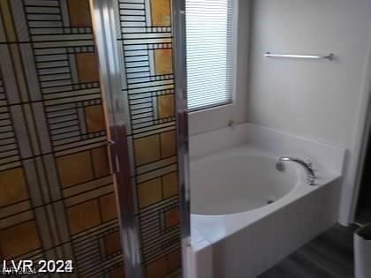 4085 Oliver Sagebrush Dr, Las Vegas, NV 89122 - bathroom with a garden tub
