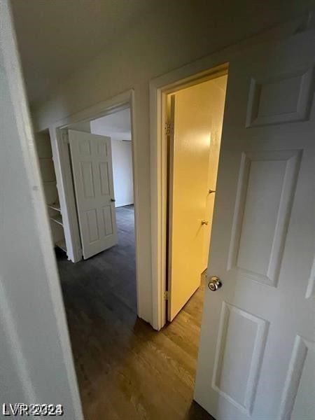 hallway featuring hardwood / wood-style flooring