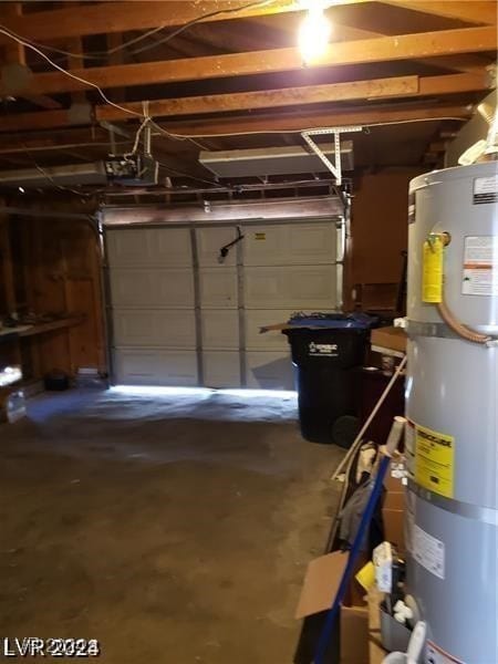 garage featuring secured water heater