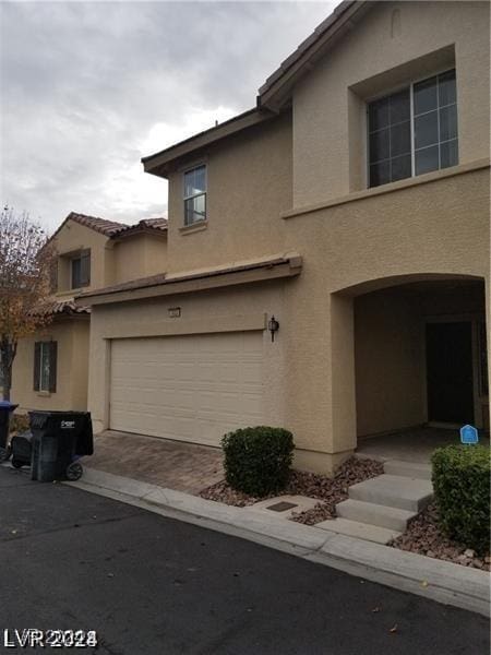 view of front of house with a garage