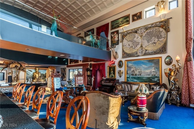 interior space with a high ceiling and an ornate ceiling