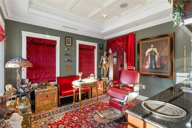 living area with baseboards, coffered ceiling, and crown molding