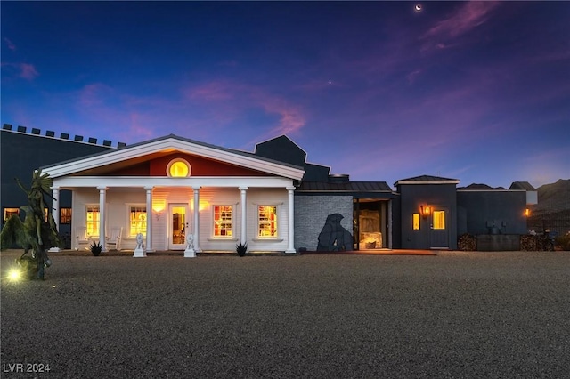 view of front of home featuring covered porch