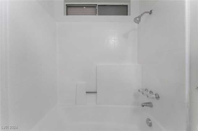 bathroom featuring bathing tub / shower combination