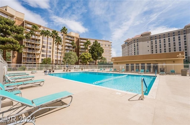 view of swimming pool with a patio