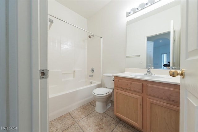 bathroom with tub / shower combination, vanity, toilet, and tile patterned floors