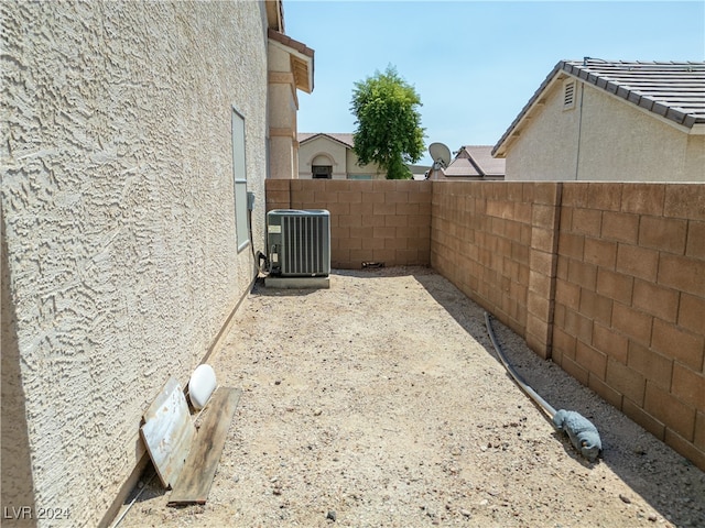 view of yard featuring central air condition unit