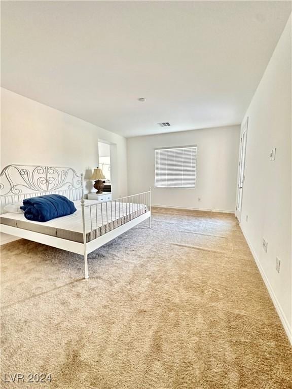 unfurnished bedroom with carpet