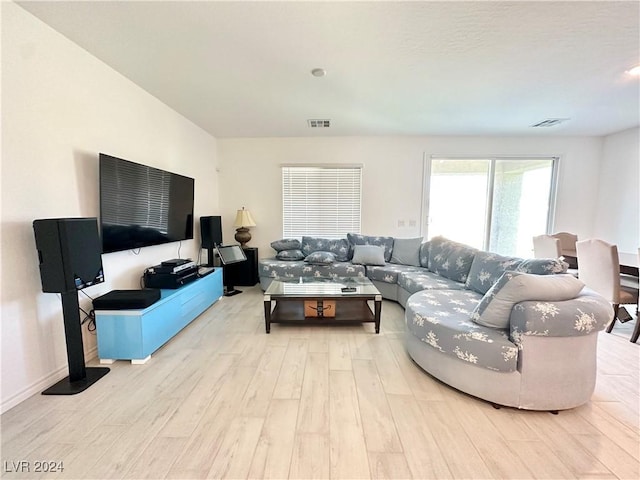 living room with light hardwood / wood-style floors