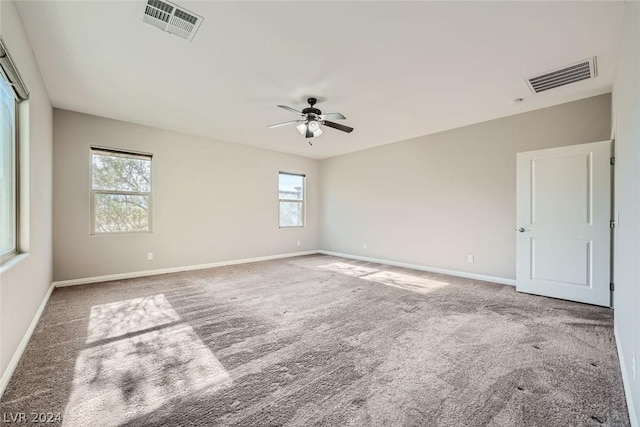 unfurnished room with carpet floors and ceiling fan