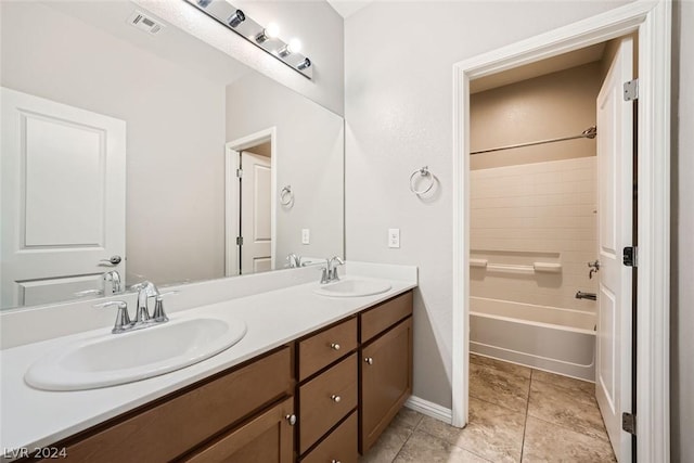 bathroom featuring vanity,  shower combination, and tile patterned floors