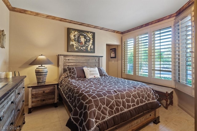 bedroom featuring crown molding