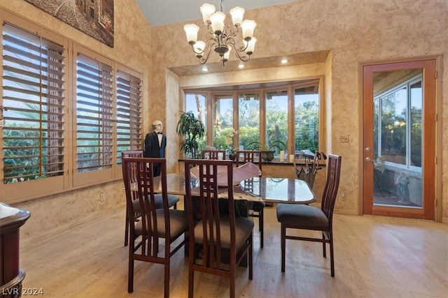 dining room featuring a chandelier and light hardwood / wood-style floors