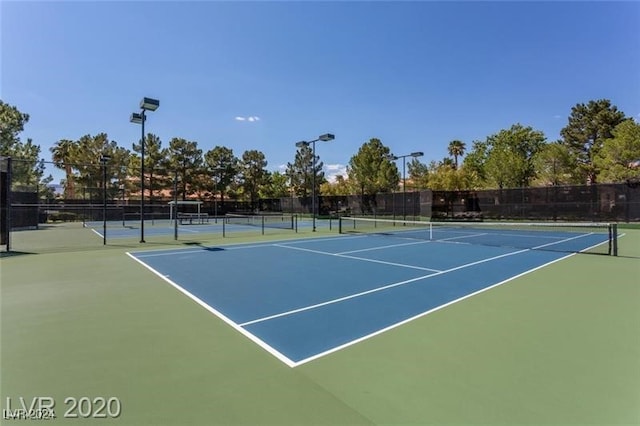 view of sport court featuring basketball hoop