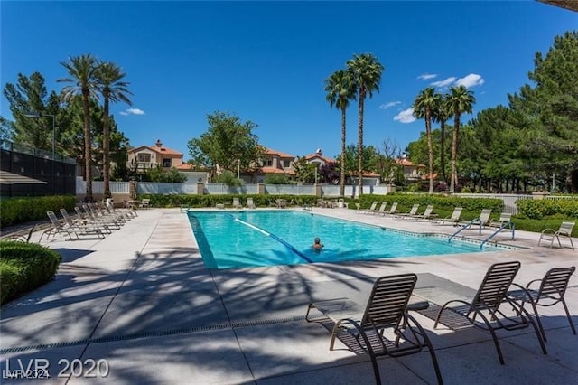 view of swimming pool featuring a patio area