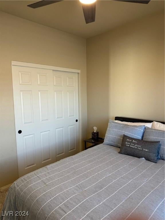 bedroom featuring a closet and ceiling fan