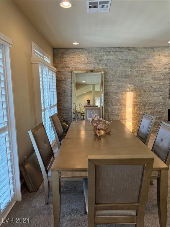 unfurnished dining area featuring visible vents and recessed lighting