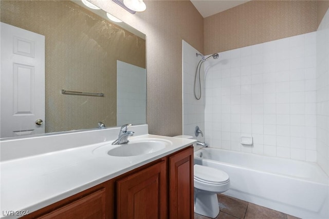 full bathroom with vanity, toilet,  shower combination, and tile patterned flooring