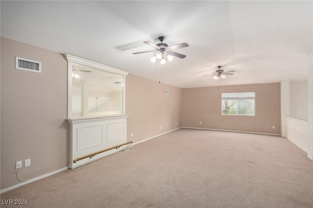 carpeted empty room with ceiling fan