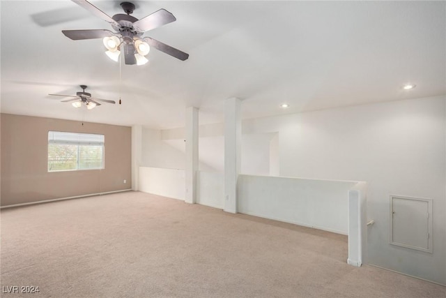 empty room featuring light colored carpet