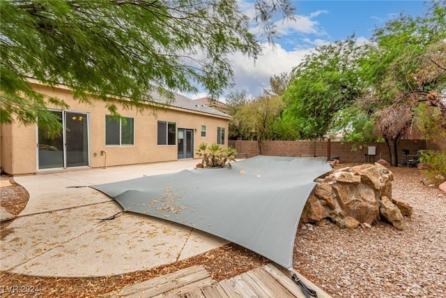 rear view of house featuring a patio area