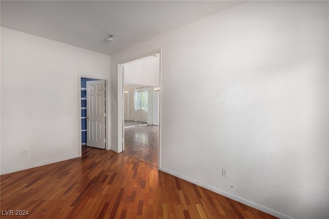 empty room featuring dark hardwood / wood-style floors