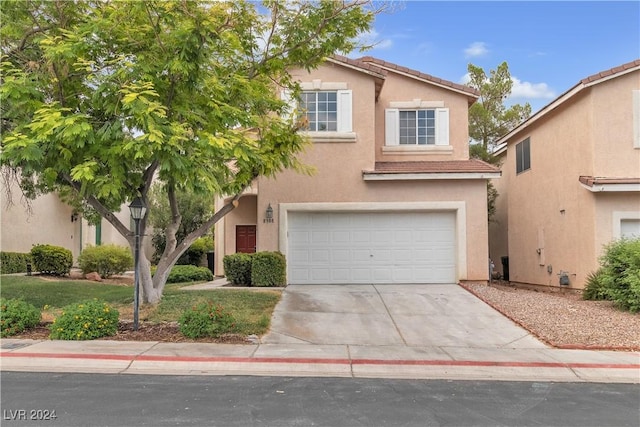 view of front property with a garage