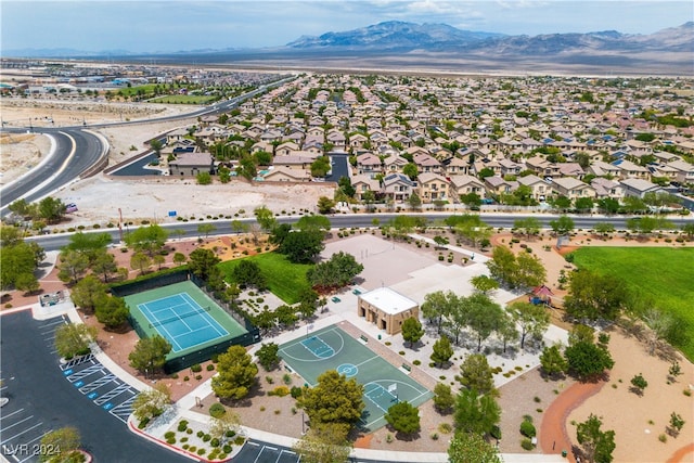 birds eye view of property featuring a mountain view