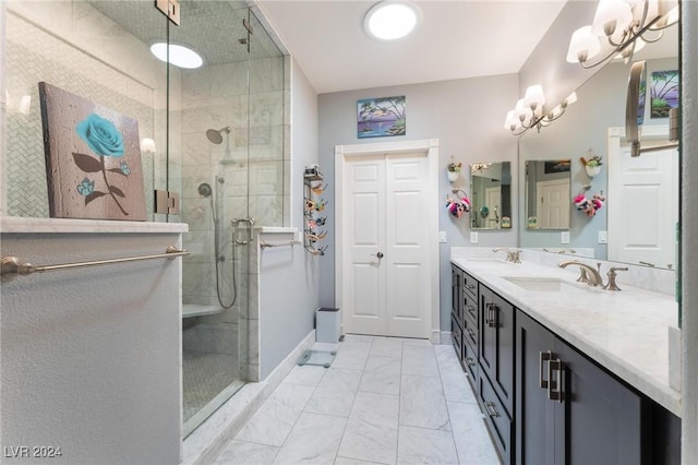 bathroom featuring walk in shower and vanity