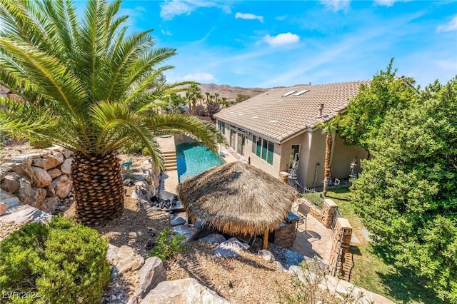 view of swimming pool featuring a gazebo and a patio area