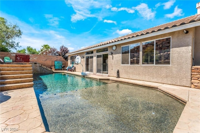 view of pool featuring a patio area