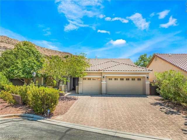 view of front of property featuring a garage