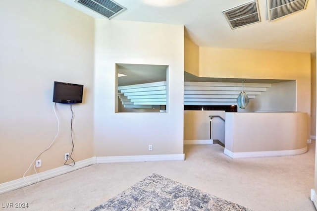 kitchen with carpet flooring