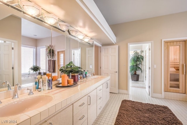 bathroom featuring vanity and tile patterned flooring