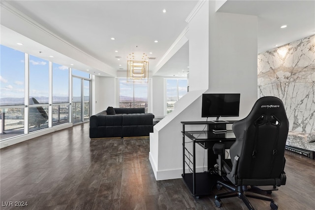 home office with ornamental molding, recessed lighting, dark wood-style flooring, and an accent wall