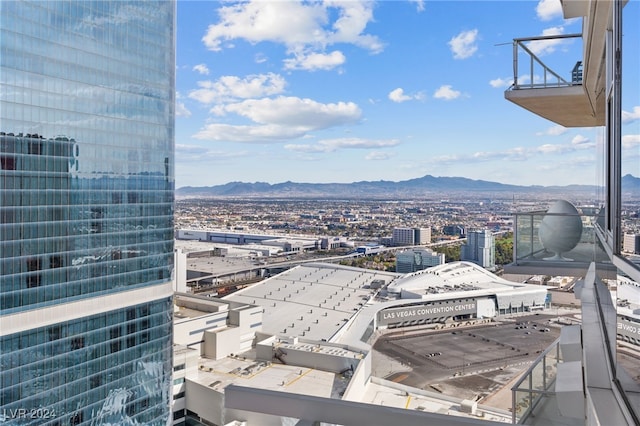 property's view of city featuring a mountain view