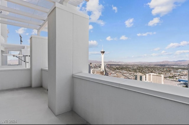 balcony featuring a view of city