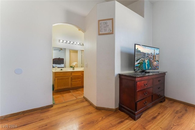 hall with light hardwood / wood-style floors