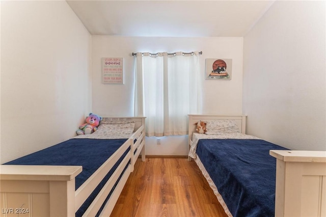 bedroom featuring hardwood / wood-style floors