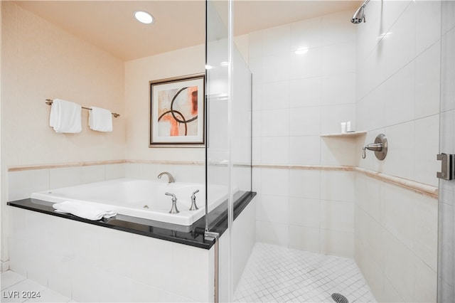 bathroom featuring tile patterned floors and plus walk in shower