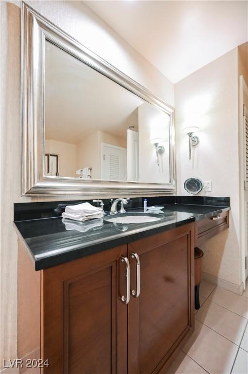 bathroom with vanity and tile patterned floors