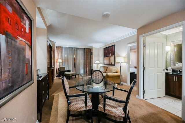 view of carpeted dining area